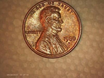 1980-D penny repunched mint mark error showing secondary D impression offset from the primary D mint mark below the date